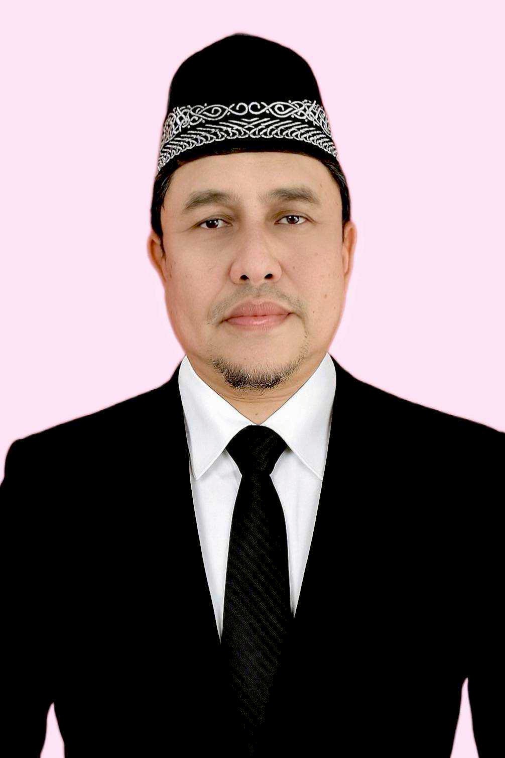 นายอาหมัดรุชดี หีมพินิจ 